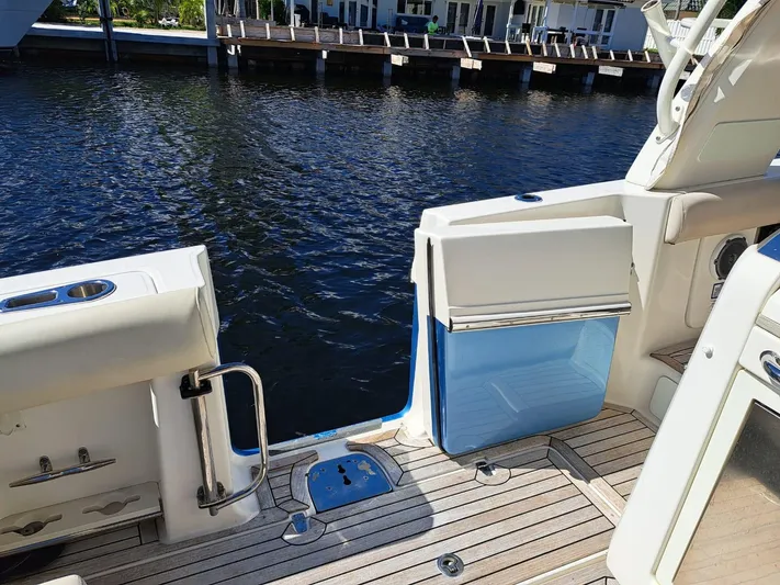 The Reel Deal Yacht Photos Pics 2016 Boston Whaler 420 Outrage boat deck with water view.