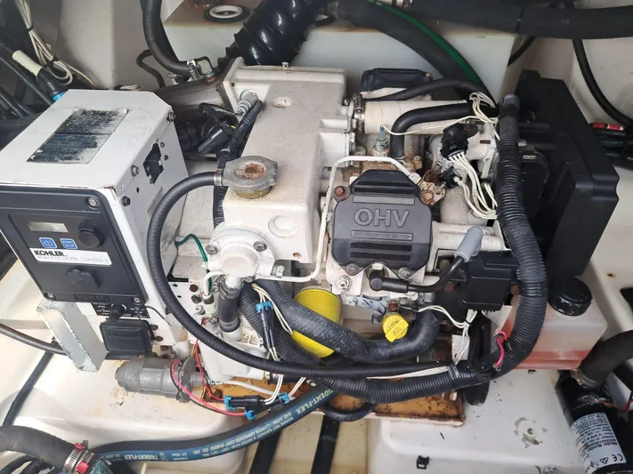 The Reel Deal Yacht Photos Pics Engine compartment of a 2016 Boston Whaler 420 Outrage boat.