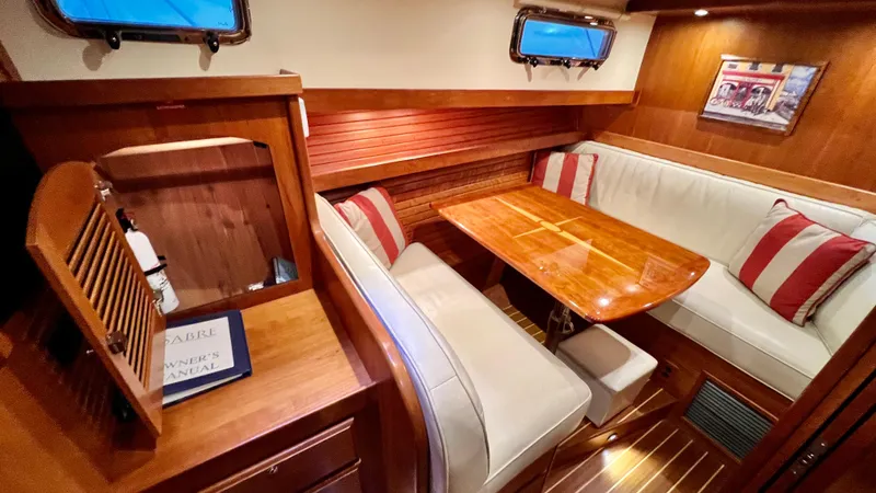 Tempest Yacht Photos Pics Luxurious interior of 2011 Sabre 40 Sedan yacht with elegant wood finishes.