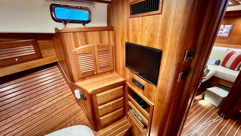 Tempest Yacht Photos Pics Luxurious 2011 Sabre 40 Sedan interior with wood paneling and modern amenities.