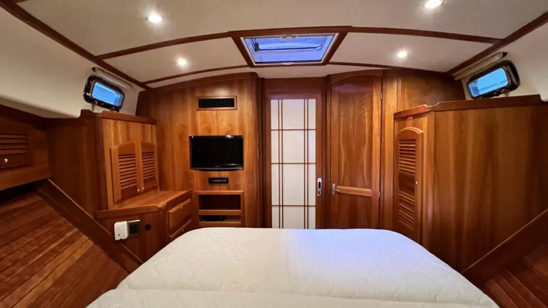 Tempest Yacht Photos Pics Luxurious 2011 Sabre 40 Sedan cabin interior with wood paneling and modern amenities.