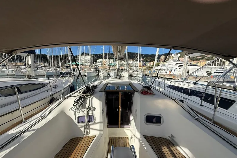 Marine Services S.a.s. Di Berruto Claudia Yacht Photos Pics 2017 Jeanneau Sun Odyssey 349 sailboat docked in a marina, showcasing cockpit and rigging.