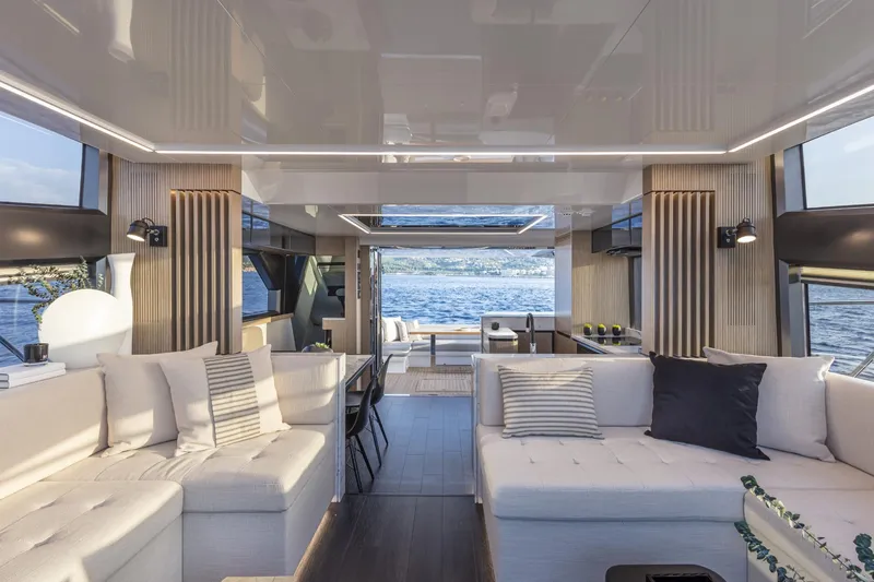 Bahari Yacht Photos Pics Luxurious interior of 2020 Pearl 62 yacht with modern design and scenic ocean view.
