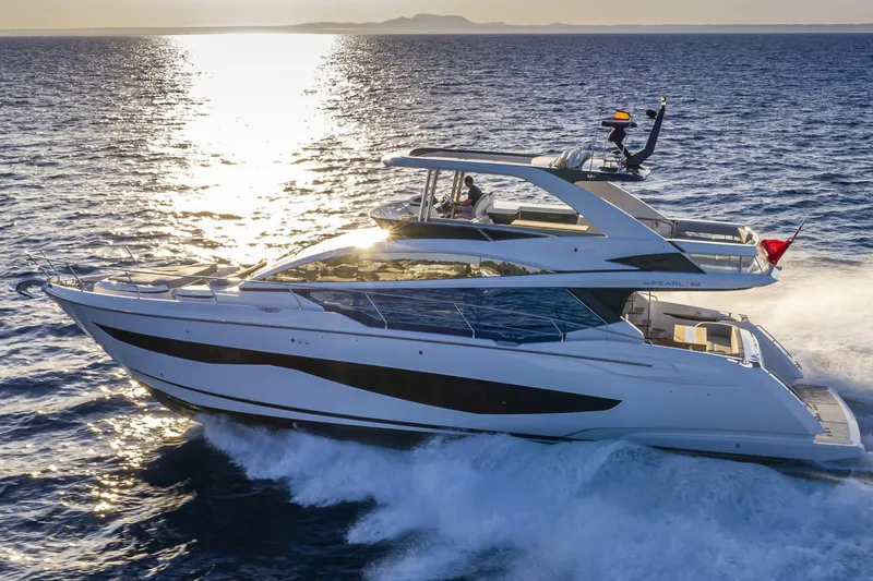 Bahari Yacht Photos Pics Luxurious 2020 Pearl 62 yacht cruising on open sea at sunset.