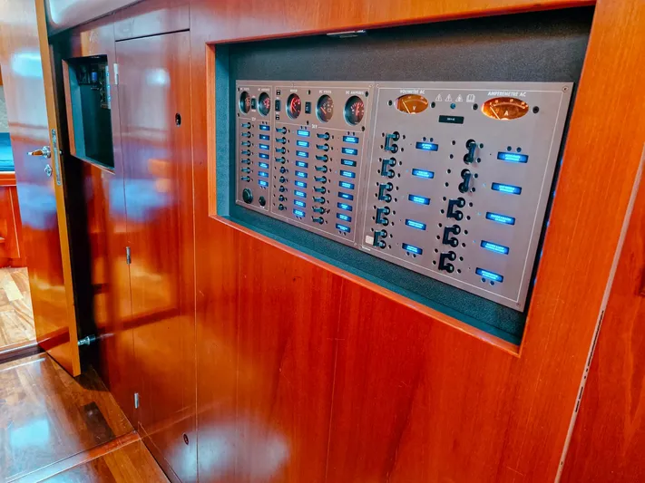  Yacht Photos Pics Electrical panel on a 2004 Beneteau 57 yacht with wooden interior.