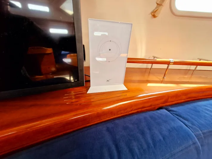  Yacht Photos Pics Interior of 2004 Beneteau 57 yacht with wooden finish and modern decor.