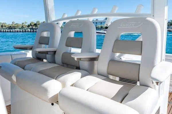  Yacht Photos Pics Luxury seating on 2018 Boston Whaler 350 Outrage boat, ocean view in background.