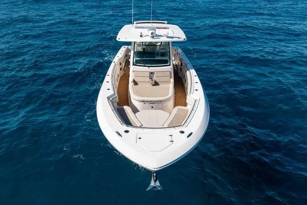  Yacht Photos Pics 2018 Boston Whaler 350 Outrage boat on open blue sea, aerial view.