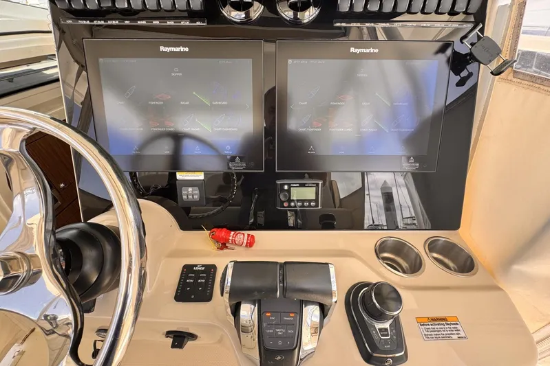  Yacht Photos Pics Control panel of 2018 Boston Whaler 350 Outrage with dual Raymarine displays.