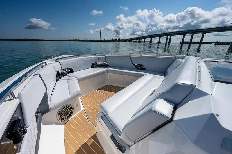 Legacy Yacht Photos Pics 2022 Formula 500 Super Sport Crossover boat interior with luxurious seating and scenic water view.