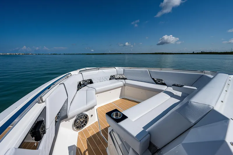 Legacy Yacht Photos Pics Luxurious 2022 Formula 500 Super Sport Crossover boat interior on calm water.