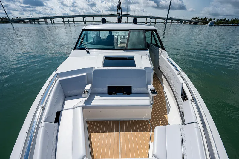 Legacy Yacht Photos Pics 2022 Formula 500 Super Sport Crossover boat with spacious seating on calm water.