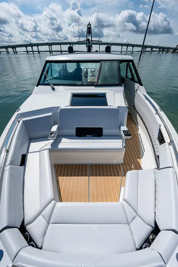 Legacy Yacht Photos Pics 2022 Formula 500 Super Sport Crossover boat with spacious seating on calm water.