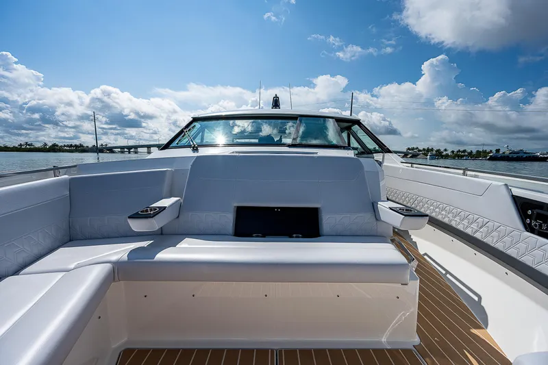 Legacy Yacht Photos Pics 2022 Formula 500 Super Sport Crossover boat interior with luxurious seating and scenic water view.