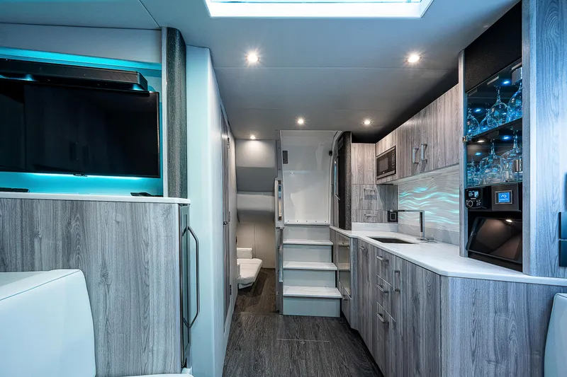 Legacy Yacht Photos Pics Luxurious interior of 2022 Formula 500 Super Sport Crossover with modern kitchen and sleek design.