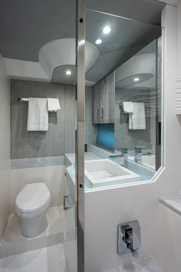 Legacy Yacht Photos Pics Modern bathroom in 2022 Formula 500 Super Sport Crossover yacht, featuring sleek design and amenities.