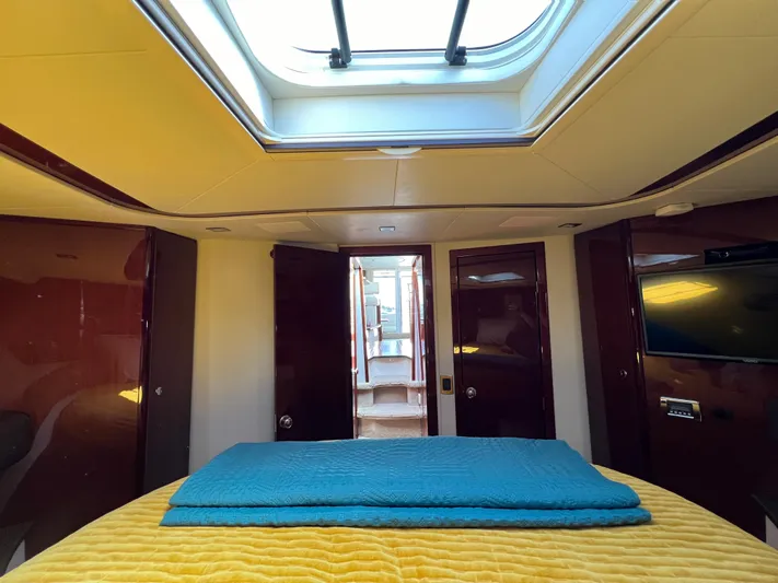  Yacht Photos Pics Luxurious interior of 2013 Meridian 441 Sedan yacht with skylight and modern amenities.