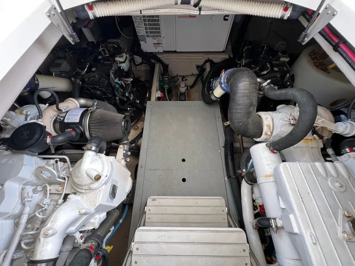  Yacht Photos Pics Engine room of a 2013 Meridian 441 Sedan yacht, showcasing mechanical components.