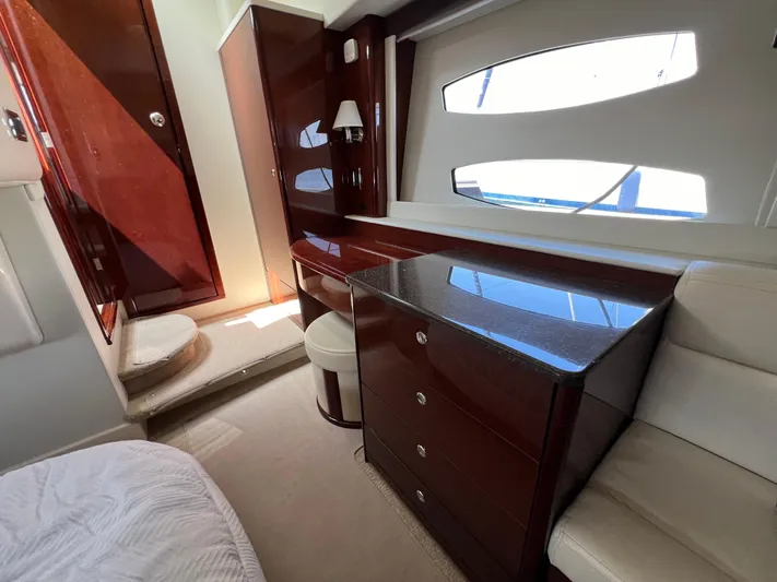  Yacht Photos Pics Luxurious interior of 2013 Meridian 441 Sedan yacht with elegant wood finishes and modern design.