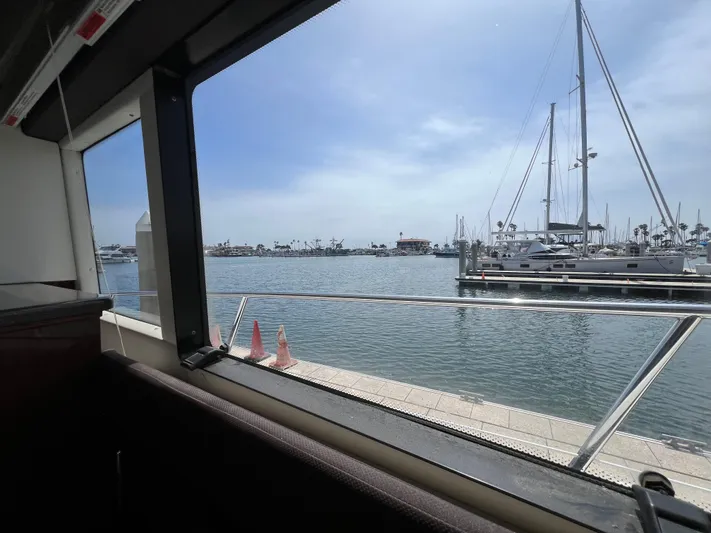  Yacht Photos Pics View from 2013 Meridian 441 Sedan, overlooking marina with sailboats and clear sky.