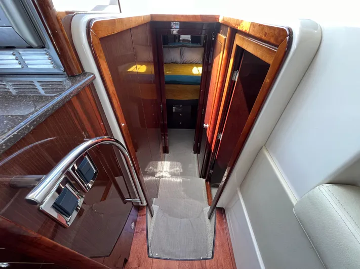  Yacht Photos Pics 2013 Meridian 441 Sedan interior with polished wood and modern design.