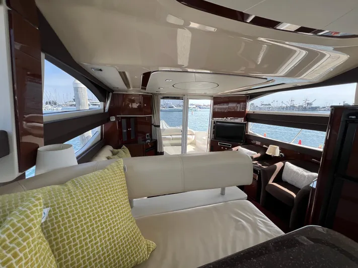  Yacht Photos Pics Luxurious interior of a 2013 Meridian 441 Sedan yacht with waterfront view.