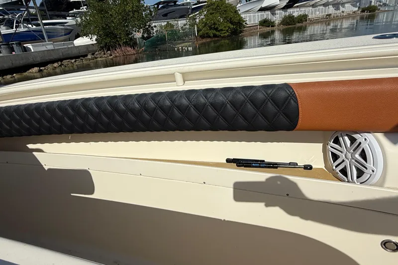 Yacht Photos Pics 2019 Scout 355 LXF boat interior with quilted upholstery and speaker detail.