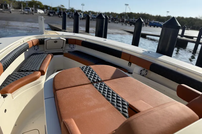  Yacht Photos Pics 2019 Scout 355 LXF boat interior with luxurious seating and waterfront view.