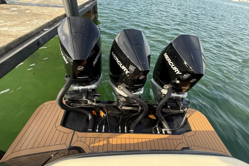  Yacht Photos Pics 2019 Scout 355 LXF with triple Mercury outboard engines at dock.