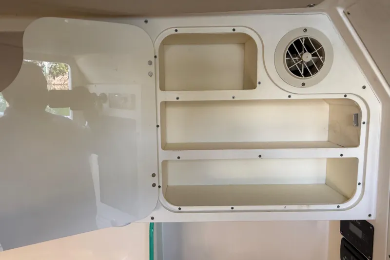  Yacht Photos Pics Interior storage shelves with vent in 2019 Scout 355 LXF boat.