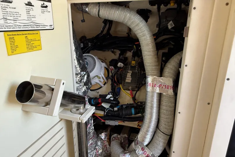  Yacht Photos Pics 2019 Scout 355 LXF engine compartment with wiring and ventilation hoses.
