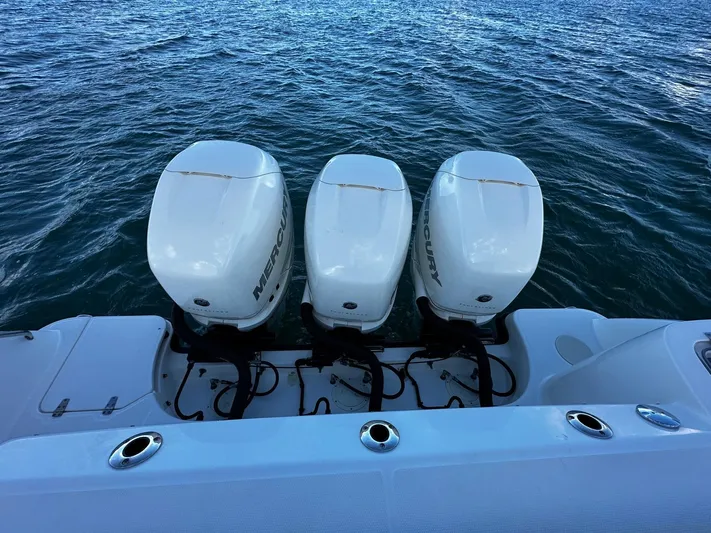 Del Mar Yacht Photos Pics 2015 Boston Whaler 345 Conquest with triple Mercury outboard engines on water.