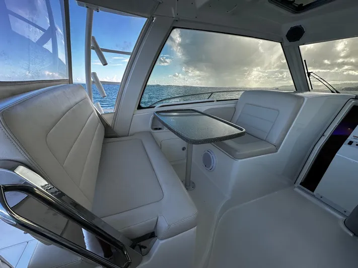 Del Mar Yacht Photos Pics Interior of 2015 Boston Whaler 345 Conquest boat with ocean view.