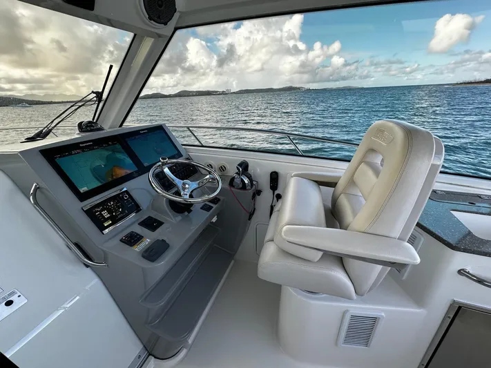 Del Mar Yacht Photos Pics Boston Whaler 345 Conquest 2015 helm with ocean view and modern controls.