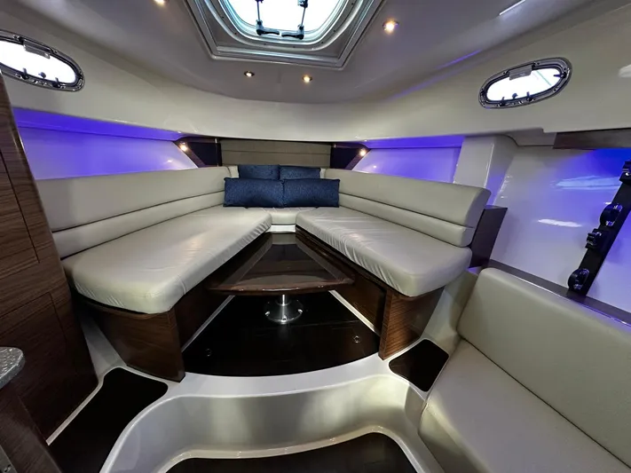 Del Mar Yacht Photos Pics Luxurious interior of 2015 Boston Whaler 345 Conquest with plush seating and ambient lighting.