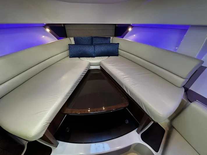 Del Mar Yacht Photos Pics Luxurious interior of 2015 Boston Whaler 345 Conquest with plush seating and ambient lighting.