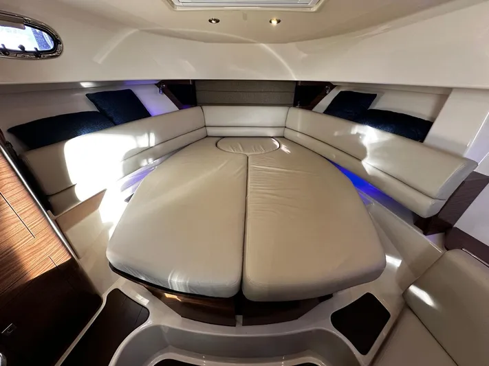 Del Mar Yacht Photos Pics Luxurious interior of 2015 Boston Whaler 345 Conquest boat cabin with plush seating.