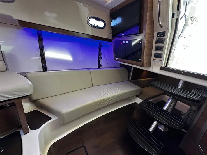 Del Mar Yacht Photos Pics Interior of 2015 Boston Whaler 345 Conquest with modern seating and ambient lighting.