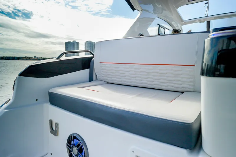  Yacht Photos Pics Luxury seating on 2026 Granfort 37 boat with scenic waterfront view.