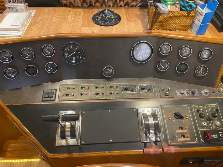 The Jolly Rogers Yacht Photos Pics Control panel of a 1987 Hi-Star Sportfish boat with various gauges and switches.