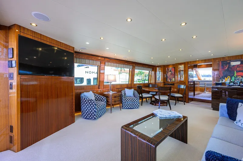 Sapphire Yacht Photos Pics Luxurious interior of 2009 Hatteras Enclosed Bridge yacht with elegant furnishings and modern decor.