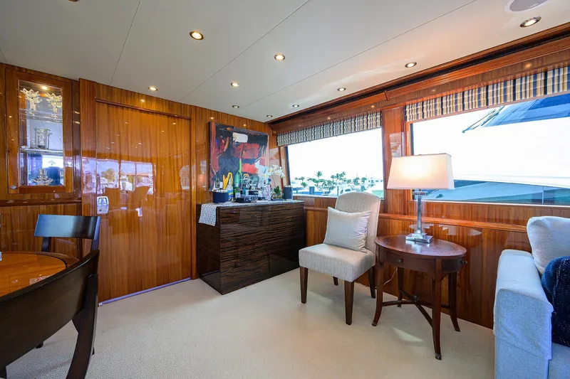 Sapphire Yacht Photos Pics Luxurious interior of 2009 Hatteras Enclosed Bridge yacht with elegant furnishings and decor.