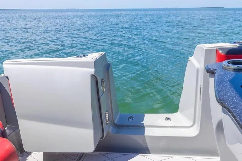  Yacht Photos Pics 2020 Deep Impact 399 Sport boat with open deck view on the ocean.