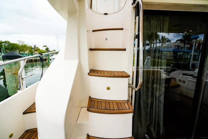  Yacht Photos Pics Staircase on 2012 Azimut Fly 53 yacht, featuring wooden steps and sleek design.