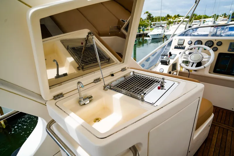 Yacht Photos Pics Outdoor kitchen on 2012 Azimut Fly 53 yacht with sink and grill.