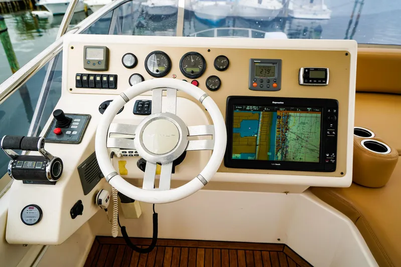  Yacht Photos Pics Cockpit of 2012 Azimut Fly 53 yacht with navigation controls and steering wheel.