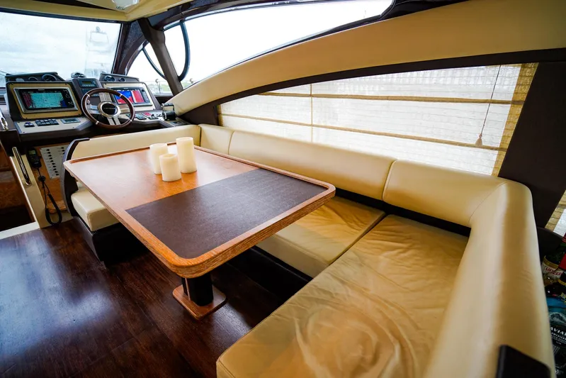  Yacht Photos Pics Luxurious interior of 2012 Azimut Fly 53 yacht with elegant seating and navigation controls.