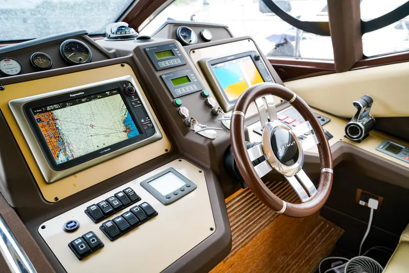  Yacht Photos Pics Cockpit of 2012 Azimut Fly 53 yacht with navigation screens and controls.