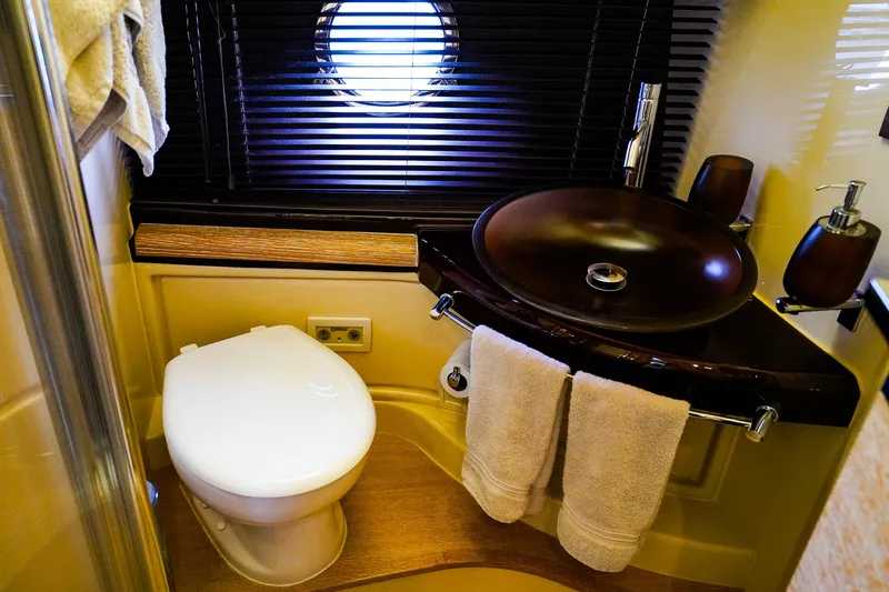  Yacht Photos Pics Luxurious bathroom in 2012 Azimut Fly 53 yacht with modern sink and toilet.