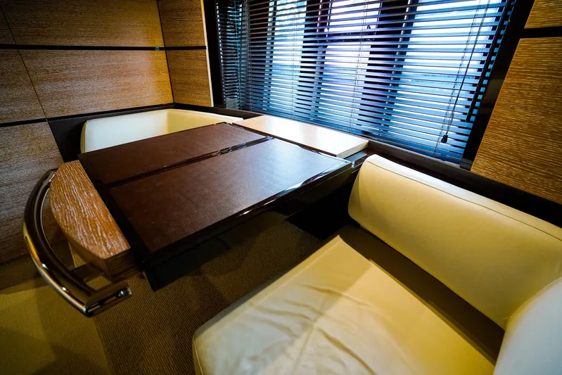  Yacht Photos Pics Luxurious interior of 2012 Azimut Fly 53 yacht with elegant seating and wooden table.